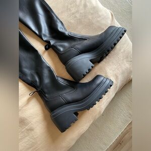 Black leather stretch boots